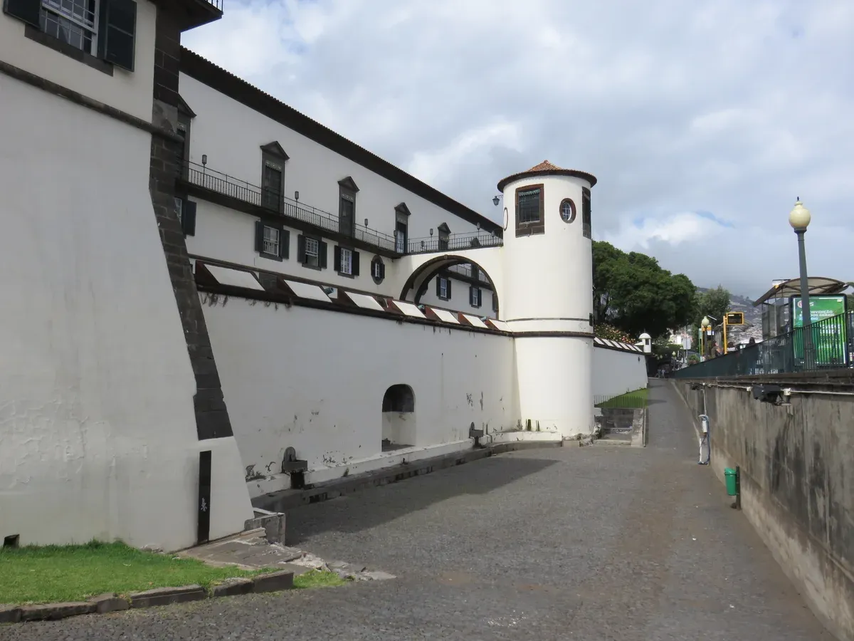 The fortified seafront wall of the Palácio de São Lourenço along the waterfront in Funchal, Madeira