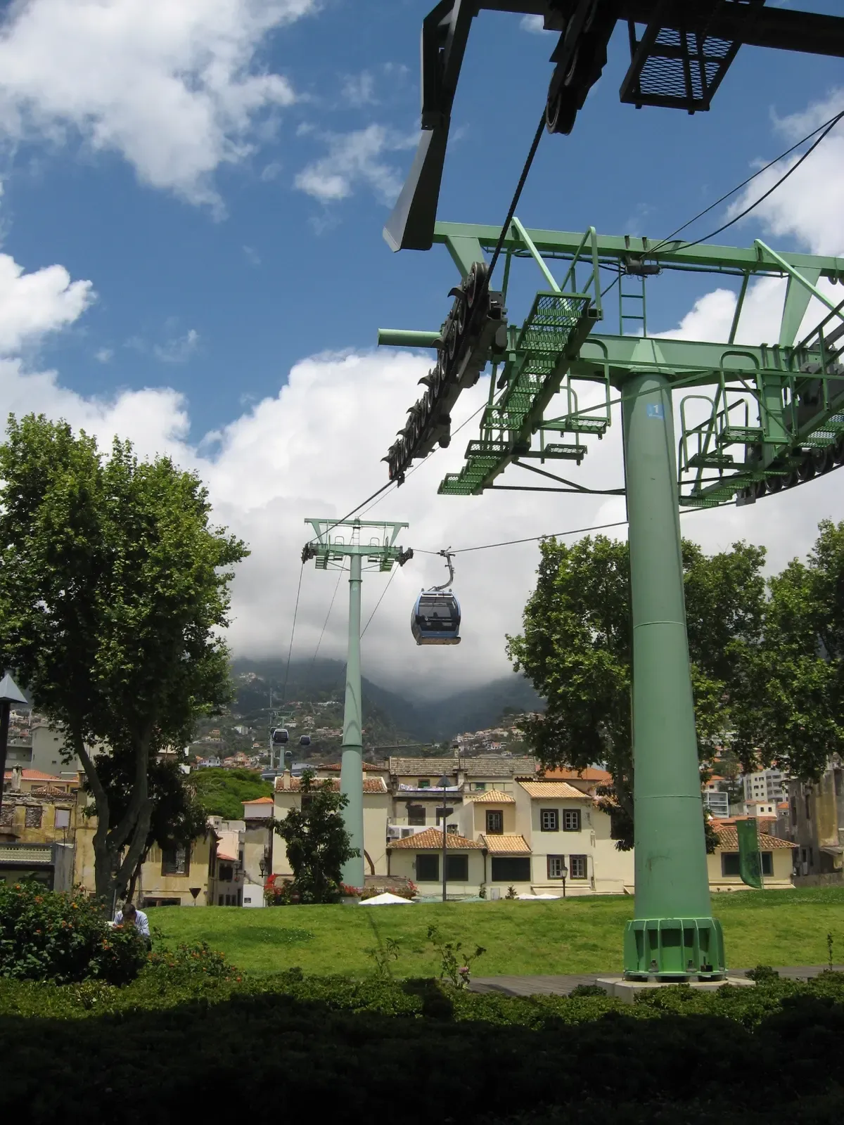A Funchal cable car cabin gliding over the town toward Monte, Madeira, on a one day in Funchal itinerary