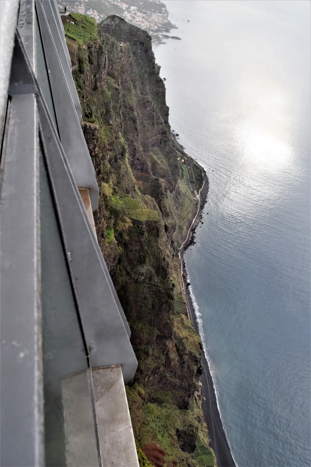The glass skywalk platform at Cabo Girao cliff near Funchal, Madeira, looking down 580 metres to the sea on day three of a Funchal itinerary