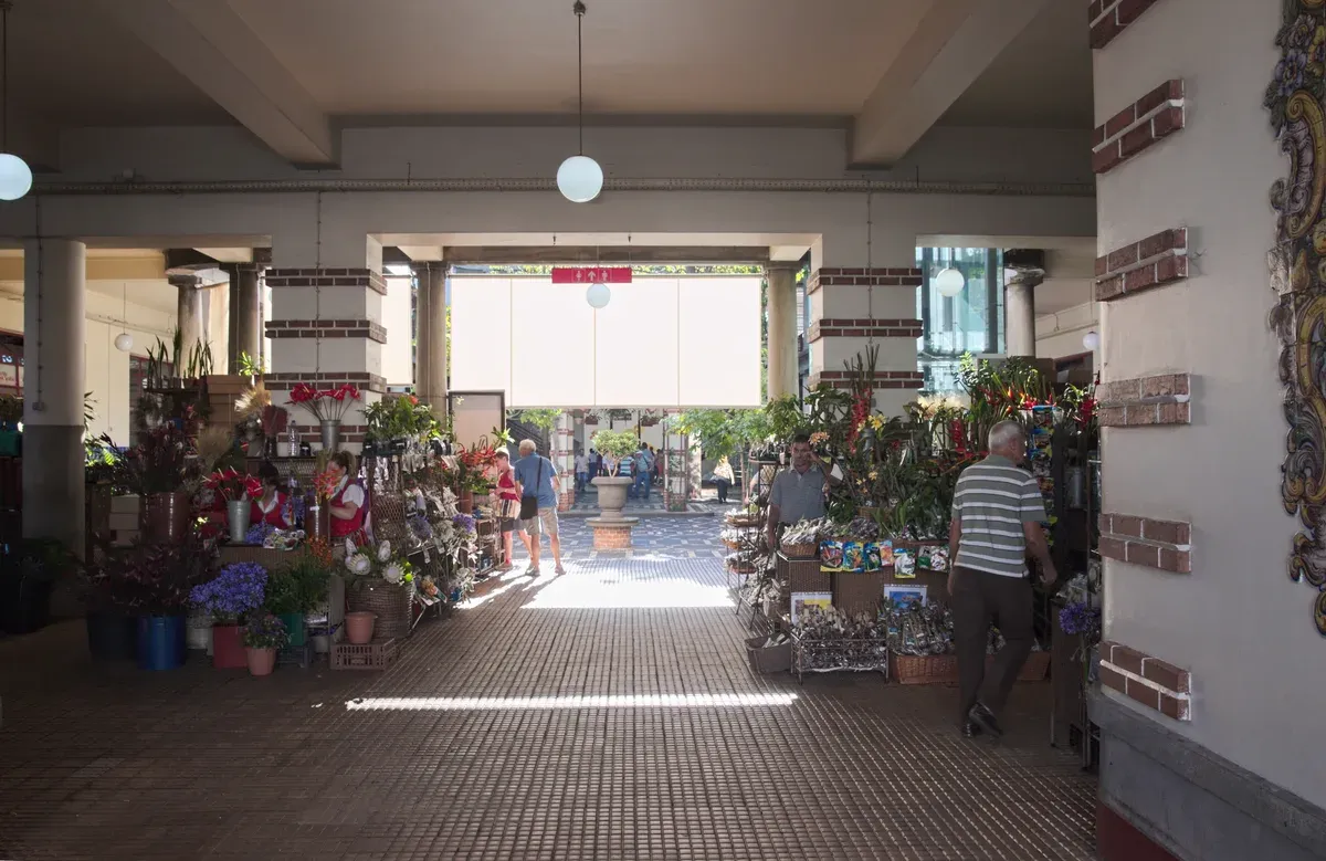 Flower stalls inside the Mercado dos Lavradores market hall in Funchal, Portugal, closed on Sundays