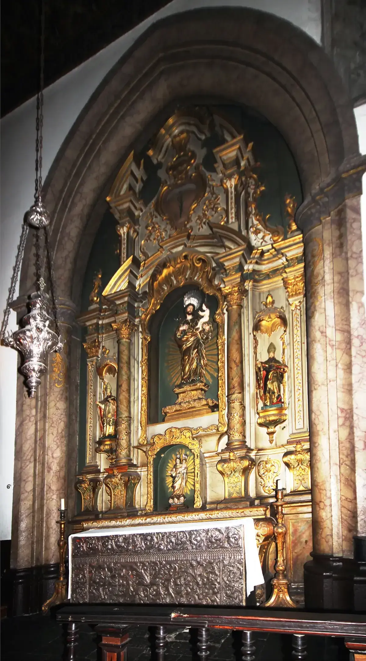 The gilded altarpiece inside the Se, Funchal cathedral, Madeira, Portugal