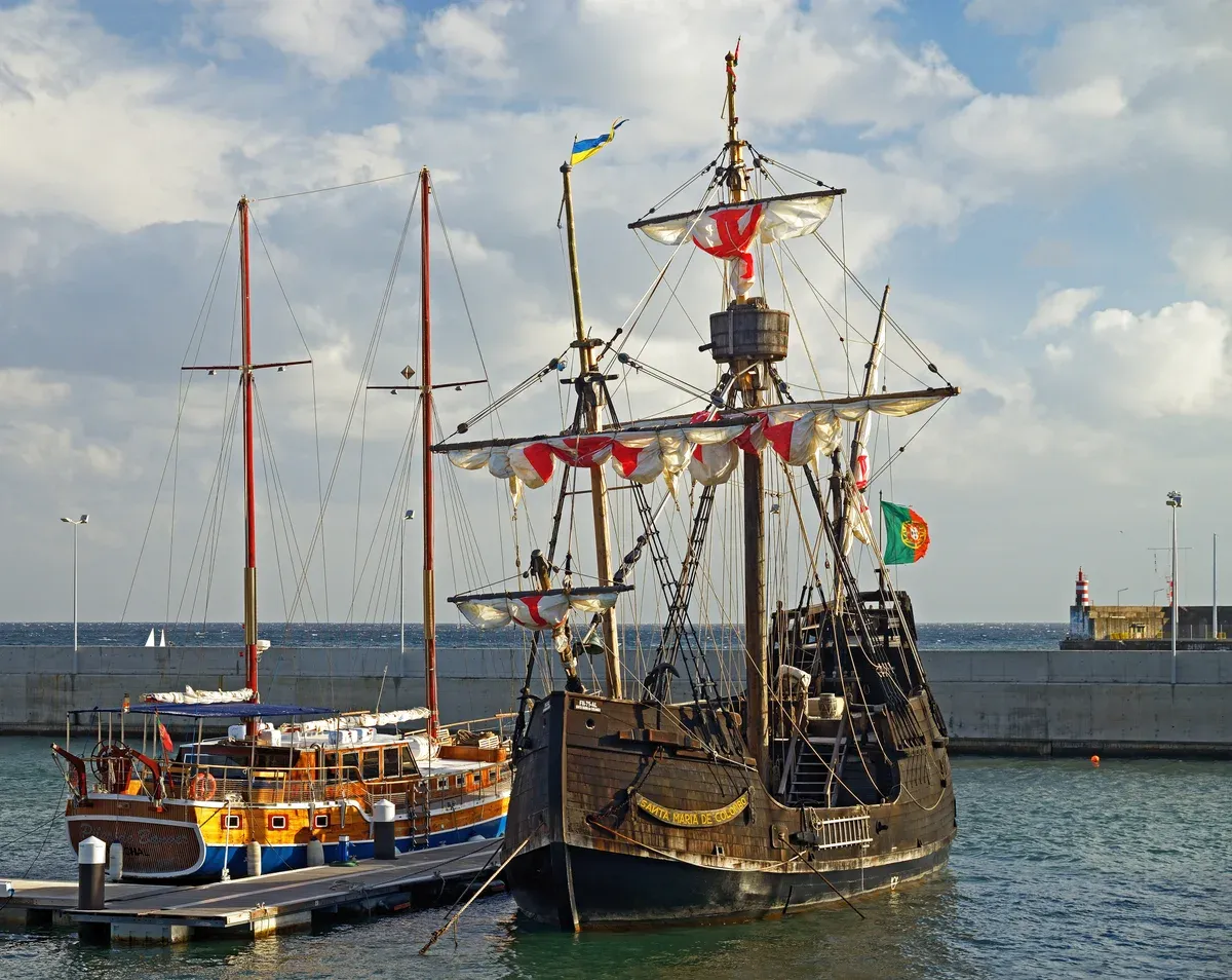 A replica of the Santa Maria sailing ship docked in the Funchal marina, Madeira, Portugal